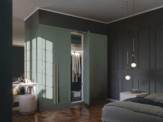 Mirrored wardrobe and bedside lamp in an upscaled bedroom