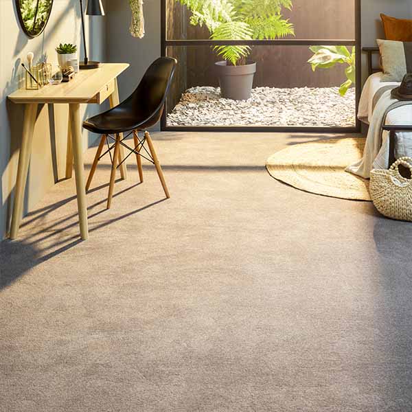 Soft wool and twist pile carpet underfoot in a cosy living room